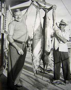 Hemingway with fish at dock